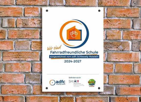 Plakette FFS auf Backstein